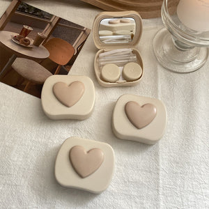 cream colored contact lens case 