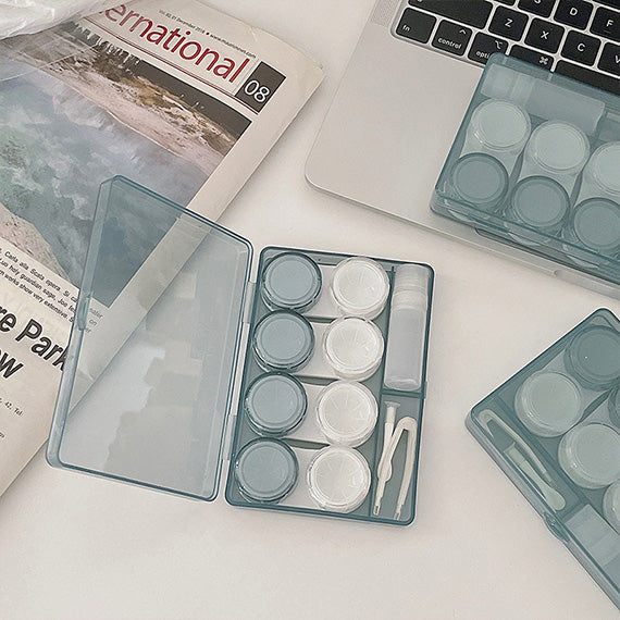 Blue contact lens storage case with tweezer, inserter, and lens bottle included
