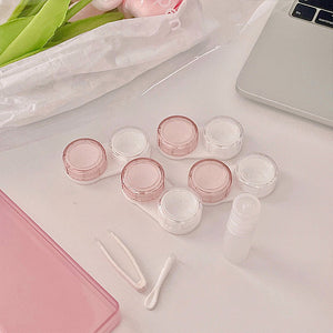 Pink contact lens case with secure leak-proof seal with lens applicator and tweezer 