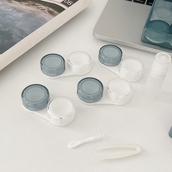 Blue transparent contact lens case with secure leak-proof seal with lens inserter and tweezer