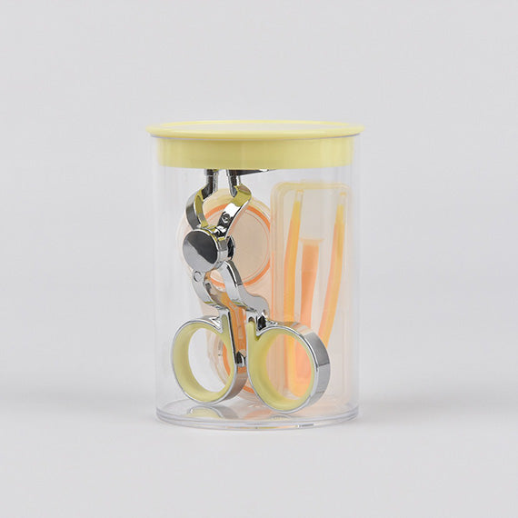 yellow eye opener tool for easy contact lens application
