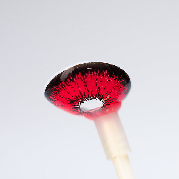 Detailed view of Princess Pinky Dolly Plus Red mini sclera lens with small pupil design