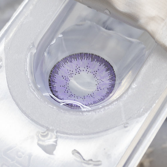 Subtle enlarging violet contact lenses