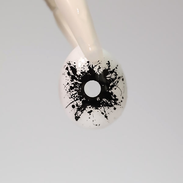 black ink splash eyes