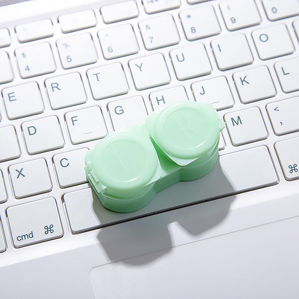 Pastel green travelcontact lens case