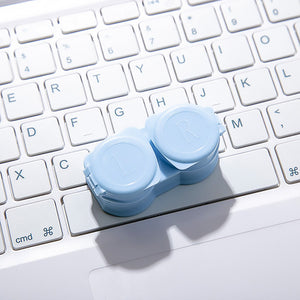 Pastel blue colored contact lens case