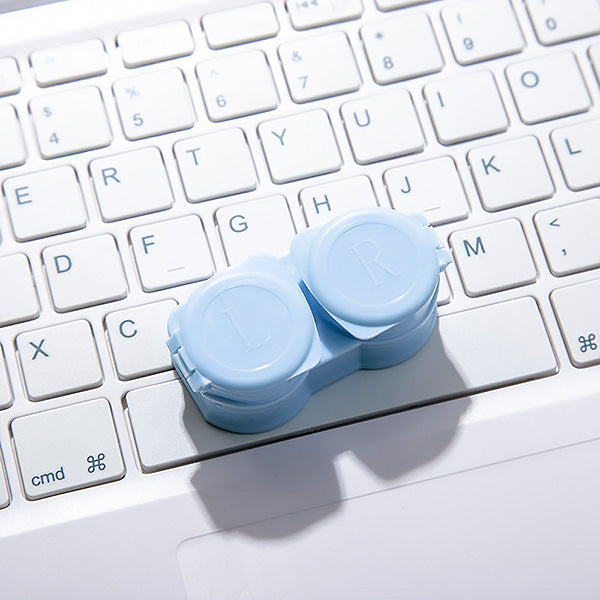 Pastel blue colored contact lens case