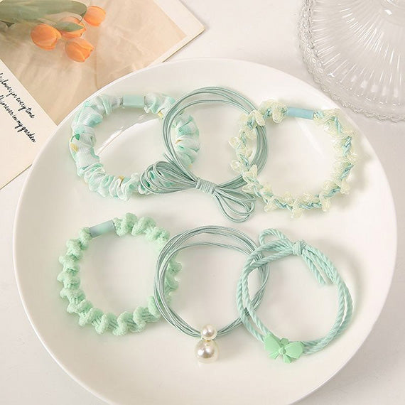 Fairycore-inspired pastel floral hair ties in mint green color 