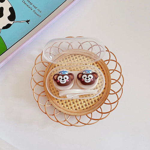 Duffy and Friends Mini Travel Lens Case with lens inserter and tweezer in Duffy Design