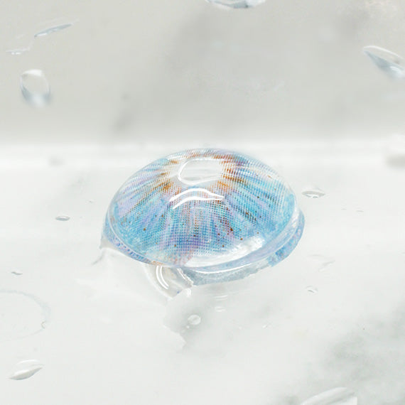 Princess Pinky Mojo Blue Color Contact Lenses on light background