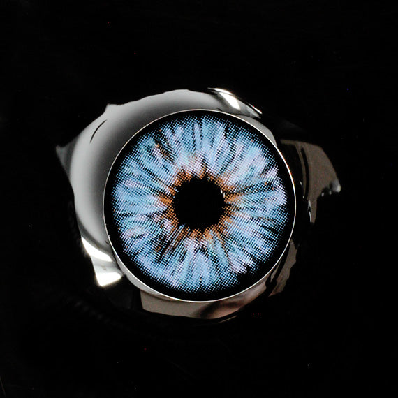 Princess Pinky Mojo Blue Colored Contacts on dark background