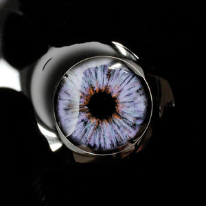 Princess Pinky Mojo Violet Colored Contacts on dark background