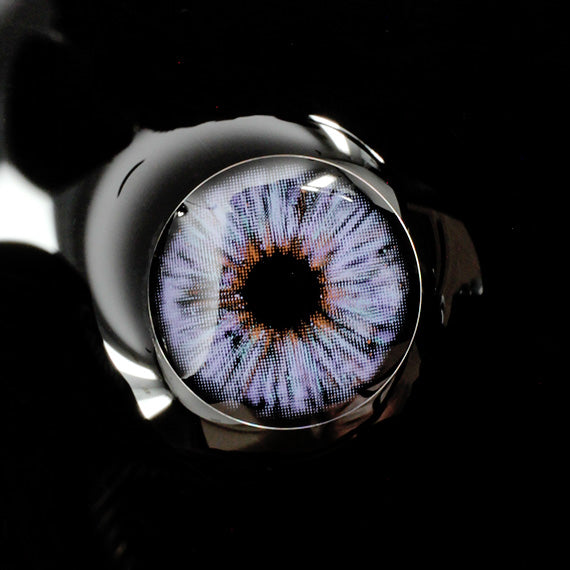 Princess Pinky Mojo Violet Colored Contacts on dark background